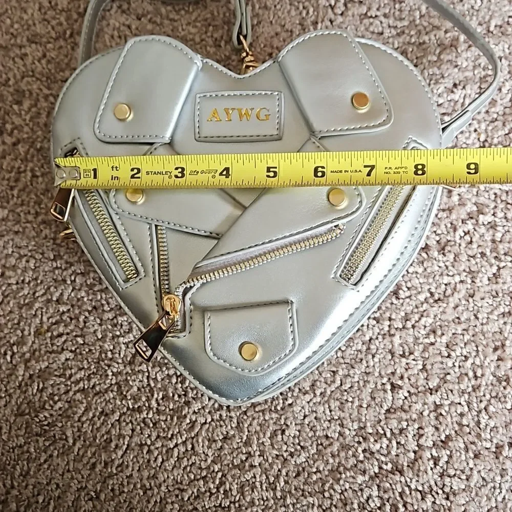 NWOT  Vegan friendly silver crossbody heart-shaped motorcycle jacket handbag